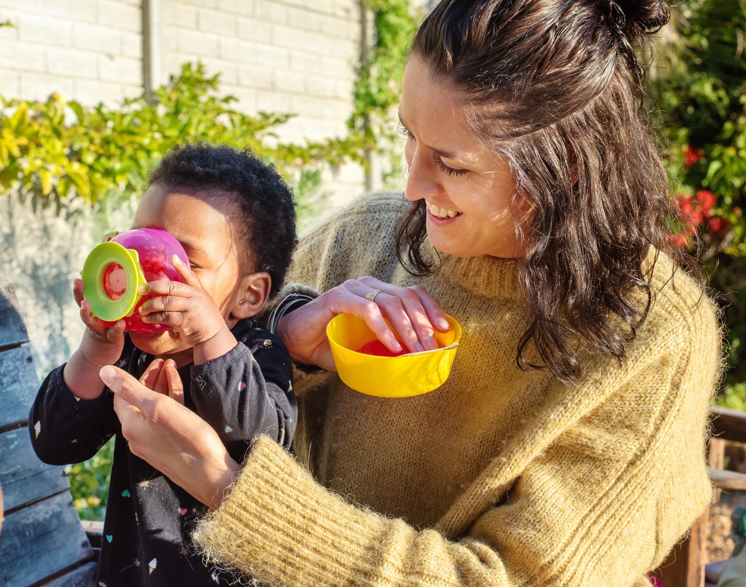 woman smiling with child